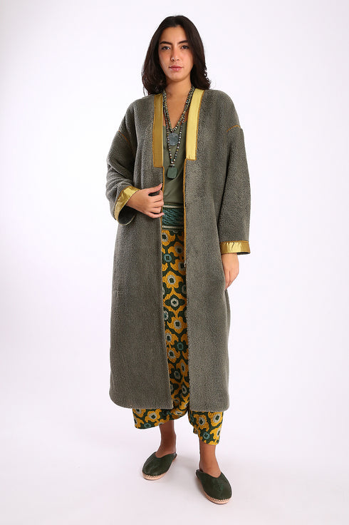 Long coat in faux fur with pockets